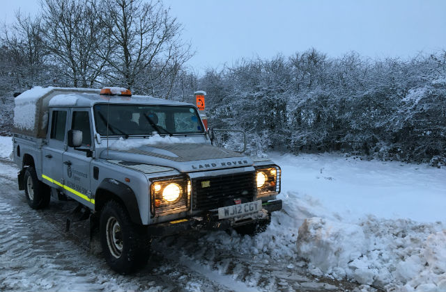 This is a photo of an Environment Agency vehicle on a snowy road