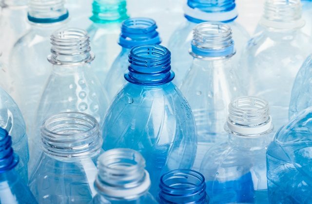 An image of several empty plastic bottles.