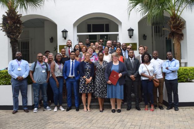 An image of Minister Coffey meeting with the team at the British High Commission in Maputo.