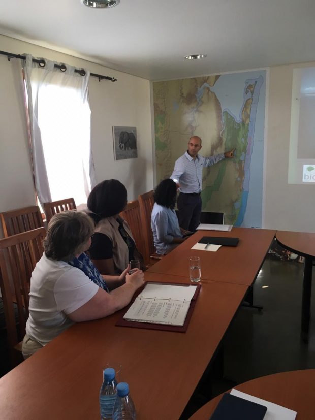 An image of Minister Coffey receiving a briefing on the size and scale of Maputo Special Reserve.