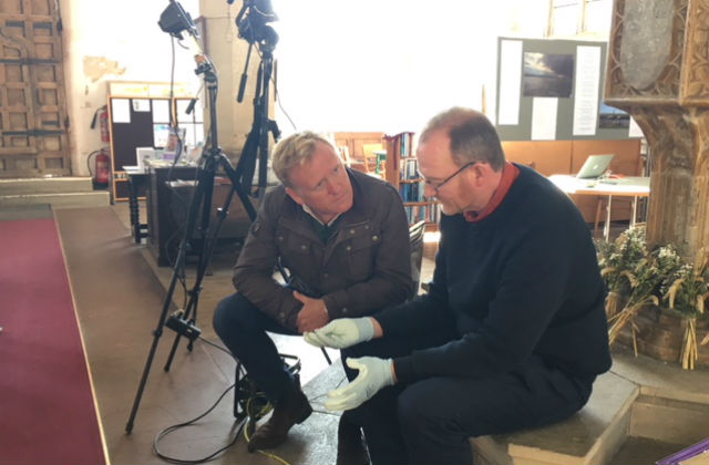 An image of John Maguire from BBC and Phil Parker from Norfolk Bats and Churches sitting viewing film.