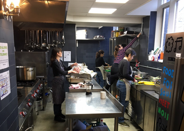 Photo: Staff preparing meals from surplus food at Refettorio Felix, a community kitchen in Earls Court London