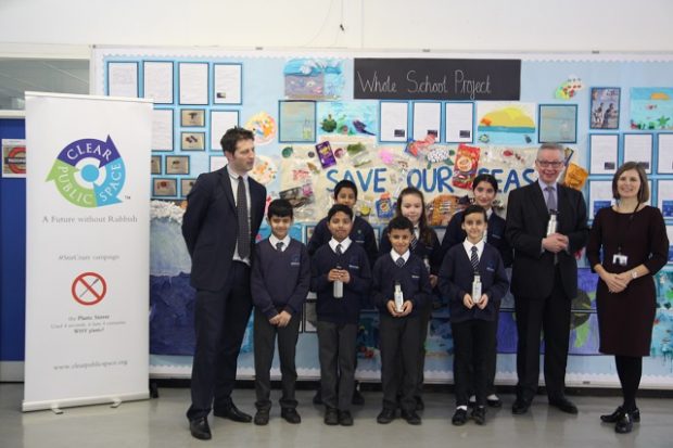 Photograph of Clear Public Space’s Luke Douglas-Home, pupils at Wilberforce Primary School, Environment Secretary Michael Gove and a teacher at Wilberforce primary school.