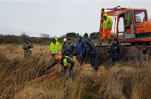 Photograph of people working on Bodmin Park Peatland