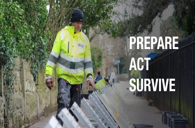 Image of a man in a high vis yellow jacket. The image has a text overlay which quotes 'prepare act survive'