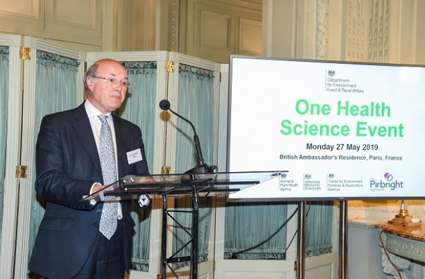 Defra Biosecurity Minister, Lord Gardiner, standing at a lectern, making a speech at the UK One Health reception