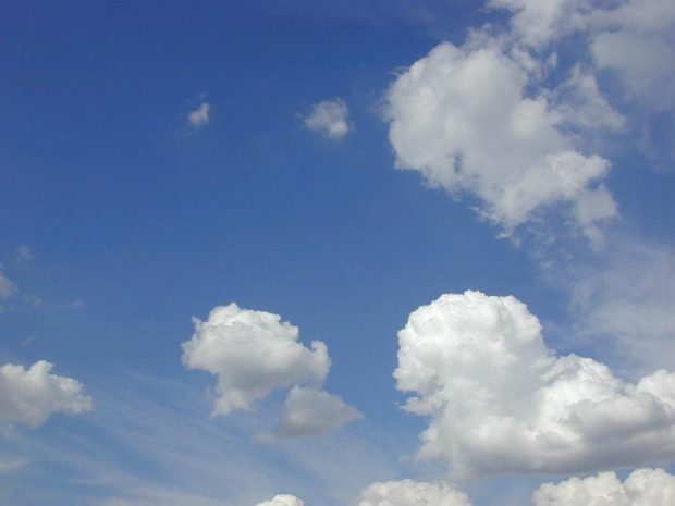 Blue sky with fluffy white clouds