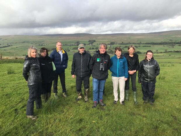 An image of Tony and the team on the visit