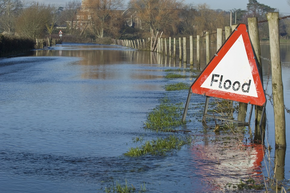 [Image: A-flood-warning-sign-on-a-closed-country...ngland.jpg]